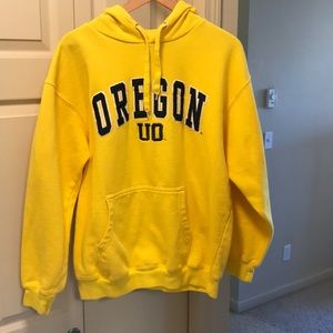 Oregon Ducks sweatshirt.